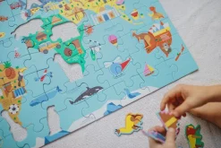 Edukacyjne|Puzzle | Mudpuppy Puzzle Mapa Świata z elementami w kształcie budynków i zwierząt 5+